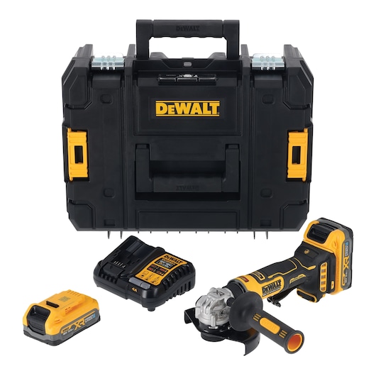 A DEWALT cordless angle grinder set including a black and yellow tool case, a battery charger, two batteries, and the angle grinder with a handle, all arranged on a white background.